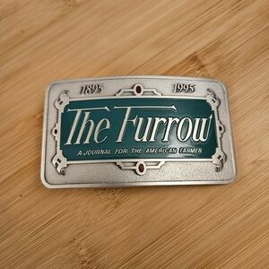 John Deere The Furrow Pewter Belt Buckle 1995 100th Anniversary Farmer Journal